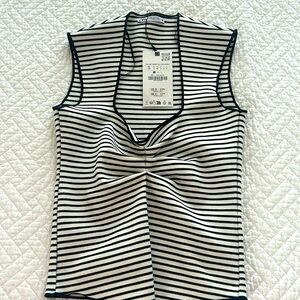 Brand new! Black and white striped v neck top